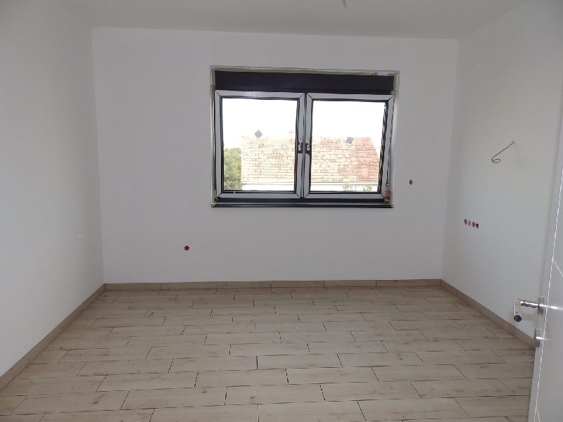Vista su una delle tre camere da letto dell'appartamento A1239.