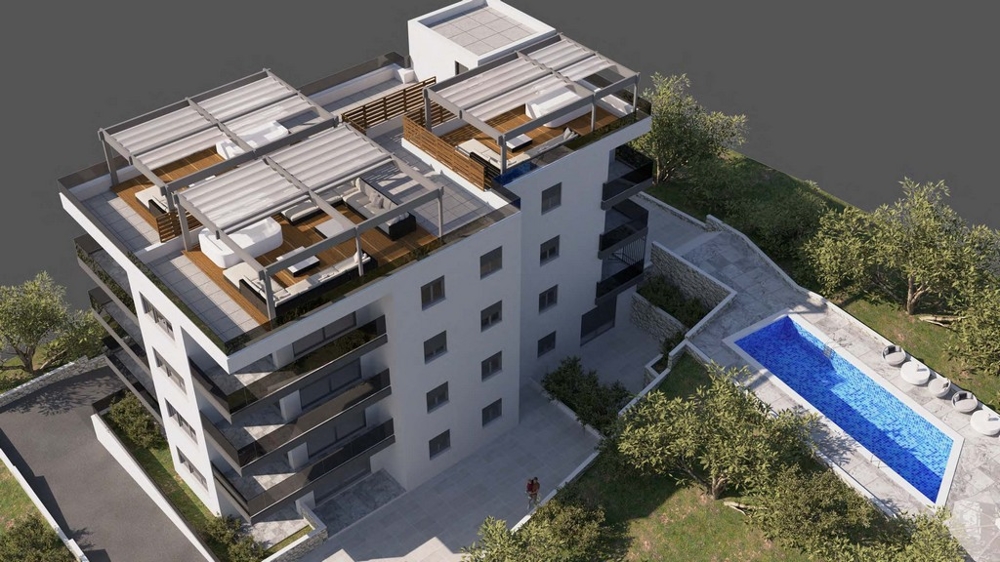 Visualizzazione dall'alto con terrazze sul tetto e piscina in giardino