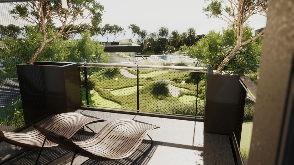 Terrazza con lettini e parapetto in vetro nel verde