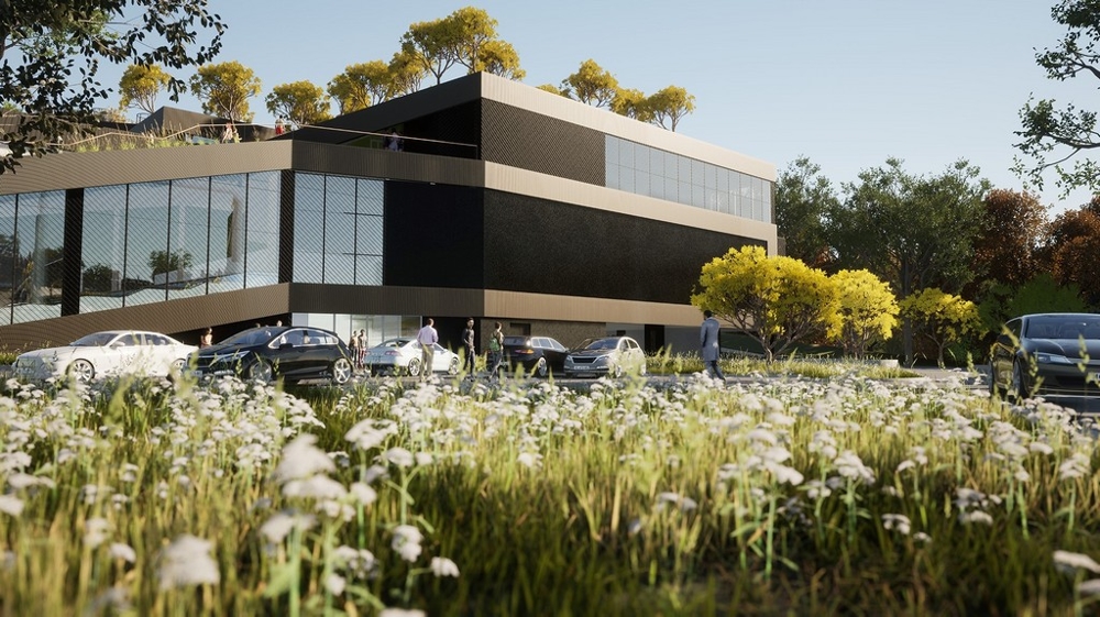 Complesso residenziale moderno con prato fiorito