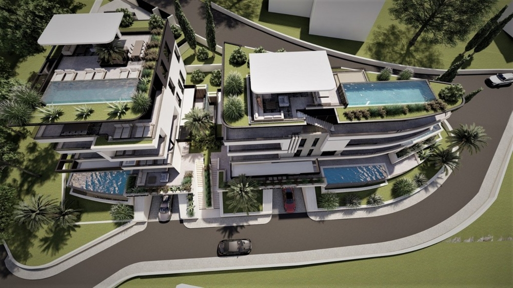 Visualizzazione dell'area con più piscine e palme