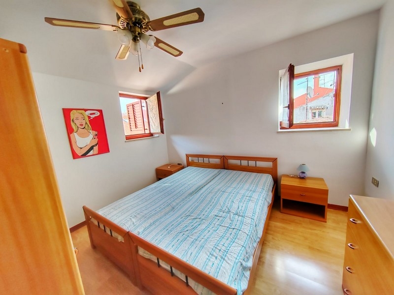 La terza camera da letto con ventilatore.