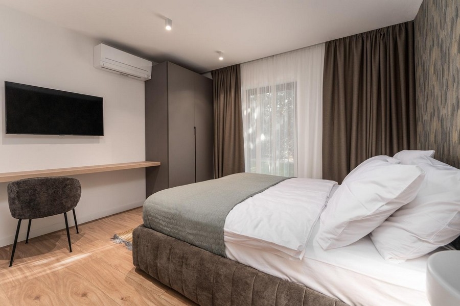 Camera da letto in appartamento di lusso in Istria con illuminazione discreta ed elegante design