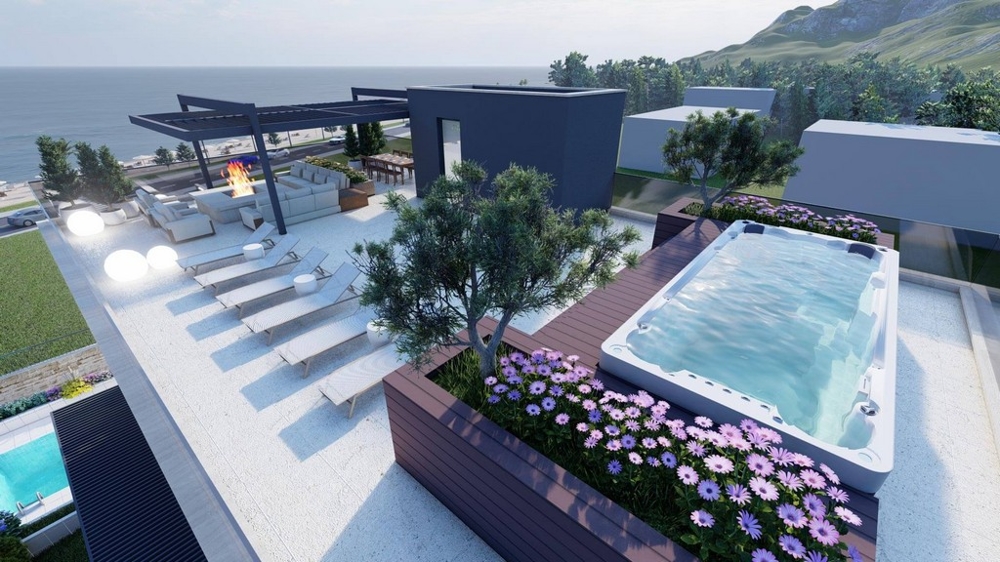 Terrazza sul tetto con vasca idromassaggio e vista mare