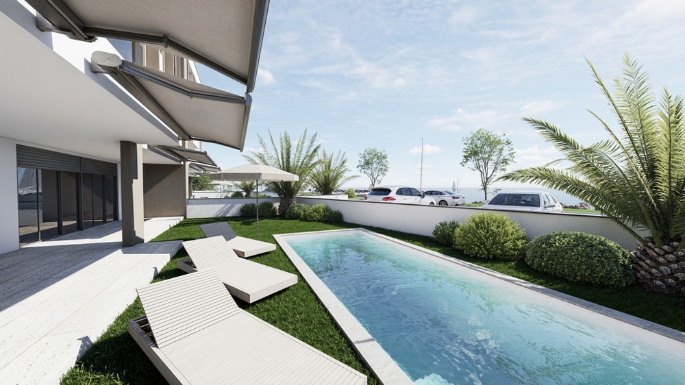 Appartamento al piano terra con piscina in un edificio nuovo direttamente sul mare in vendita - Panorama Scouting.