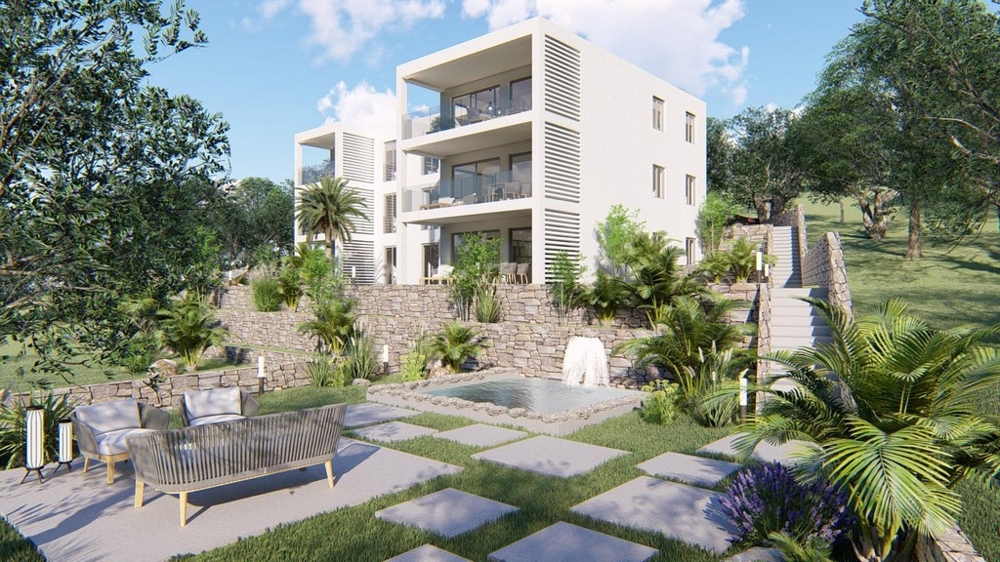 Area giardino con lounge e vista sul complesso residenziale di nuova costruzione in Croazia
