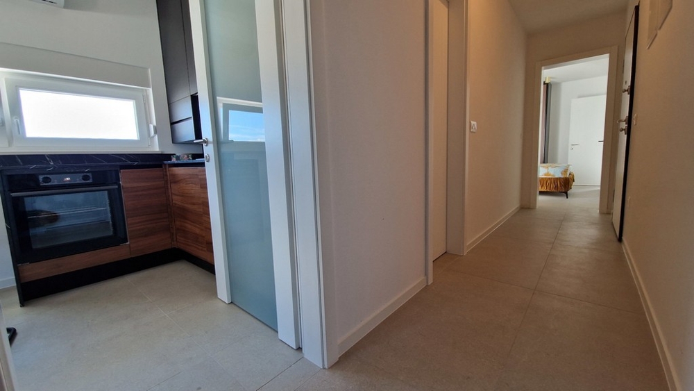 Corridoio con accesso a cucina e camere da letto