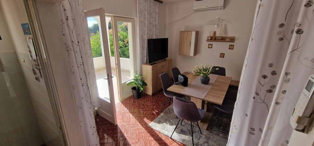Zona pranzo con accesso alla terrazza