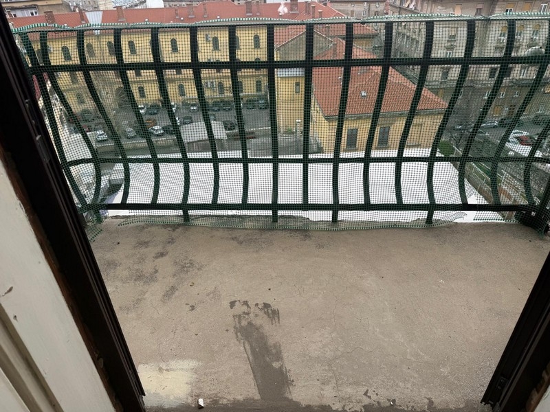 Balcone con vista sui tetti della città