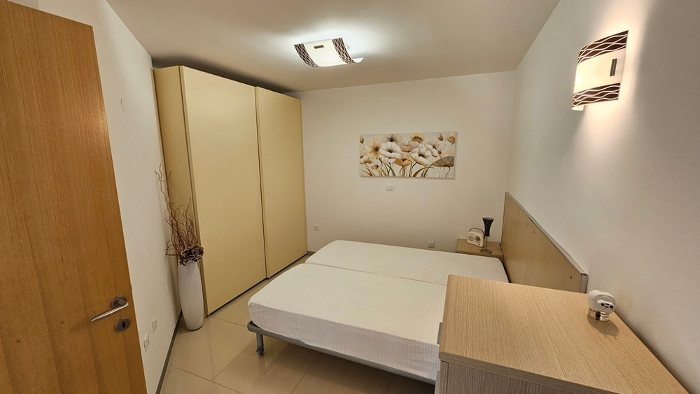 Altra camera da letto con letti singoli