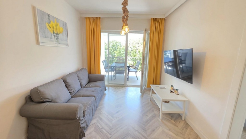 Soggiorno con accesso al balcone