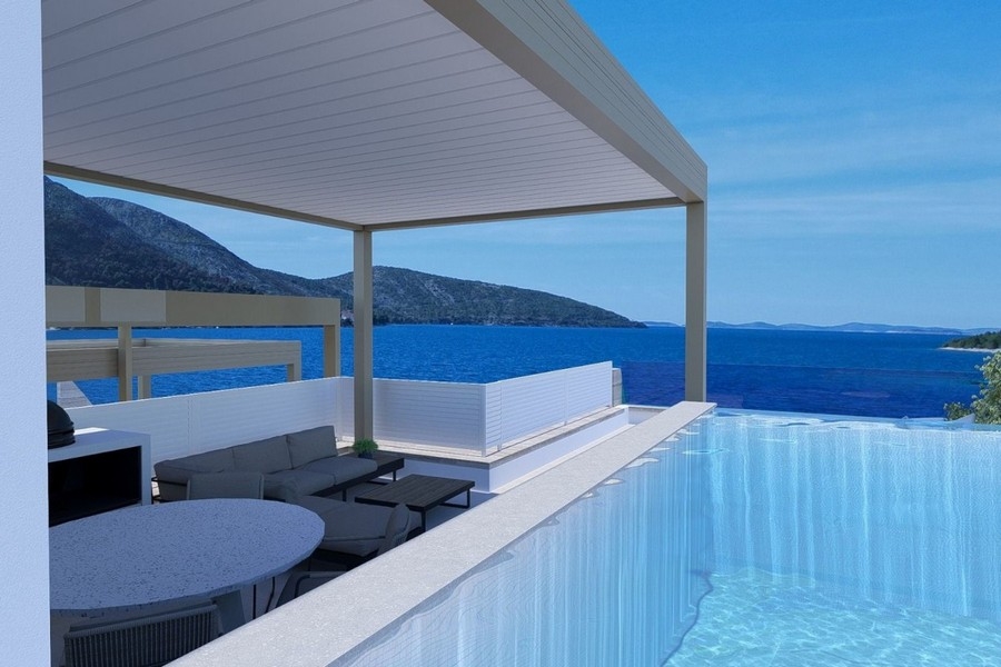 Terrazza coperta con piscina e vista mare a Primosten