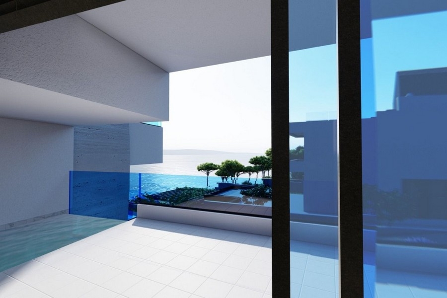 Terrazza con parapetto in vetro e vista sul mare