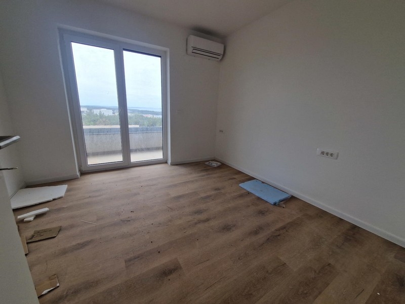 Camera da letto con accesso alla terrazza e vista mare