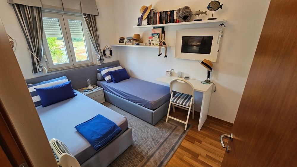 Camera da letto con due letti singoli