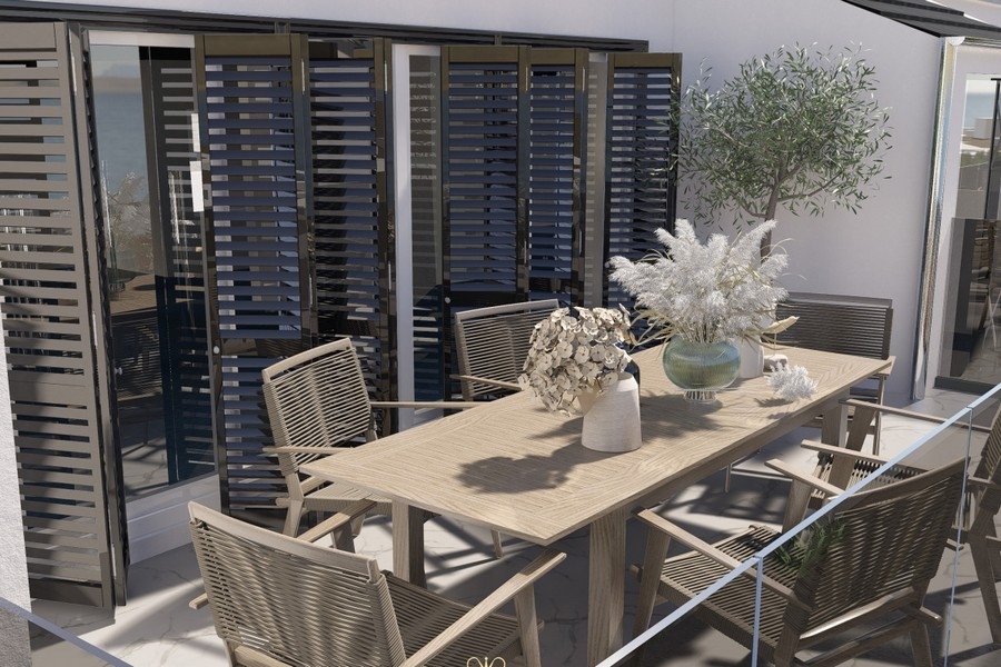 Terrazza con zona salotto e vista mare