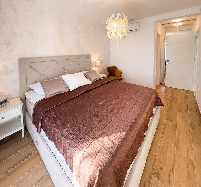 Camera da letto con letto matrimoniale in Croazia