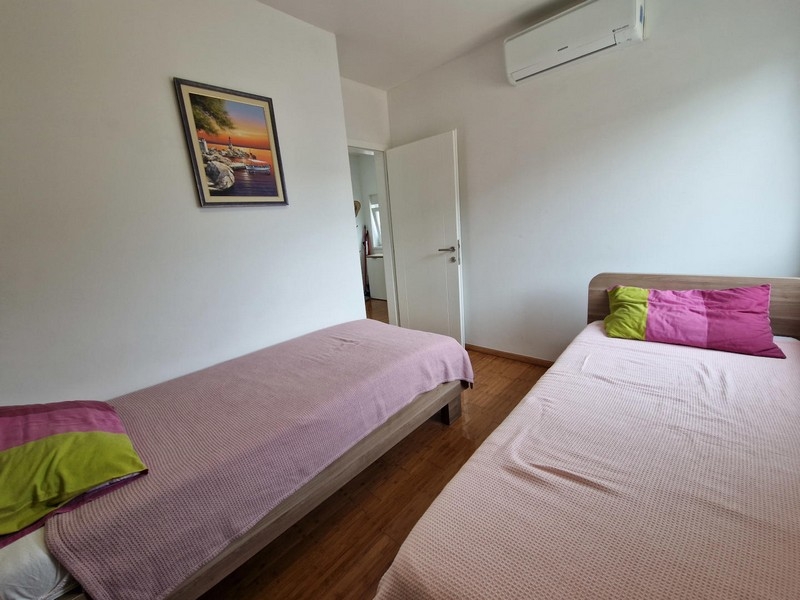Seconda camera da letto con due letti singoli