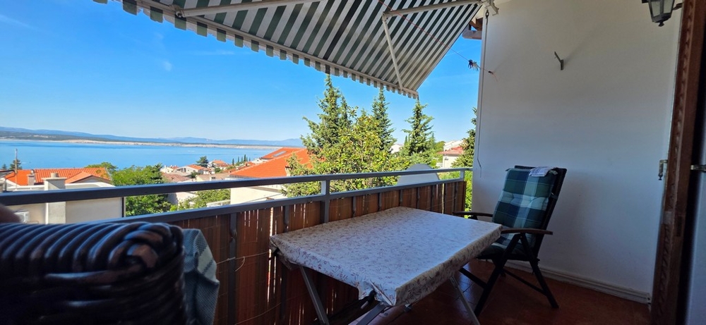 Balcone con salottino e vista sul Quarnaro, appartamento A4103