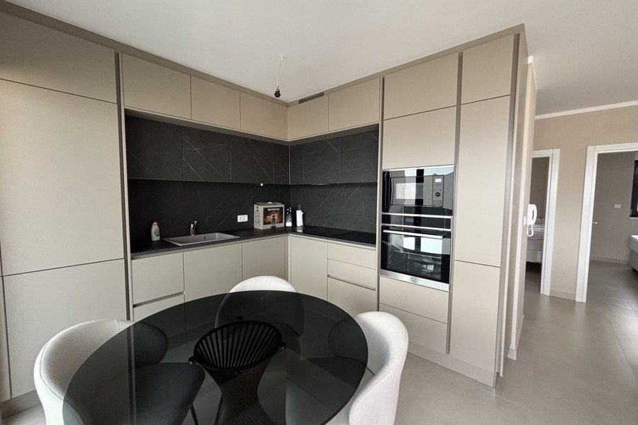 Cucina con zona pranzo nell'attico a Ciovo