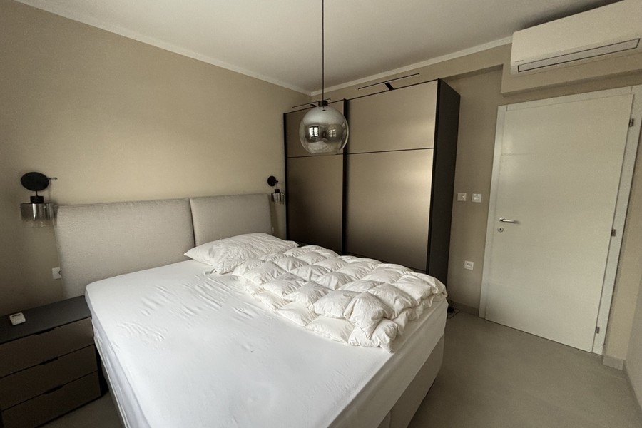 Camera da letto dell'attico a Okrug Gornji