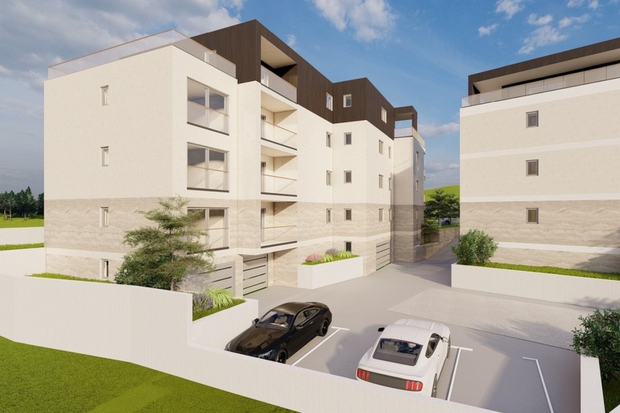 Rendering: ala dell'edificio con cortile e parcheggi