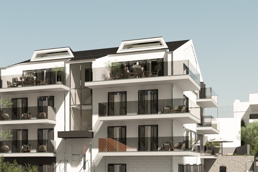 Edificio residenziale su tre piani con abbaini