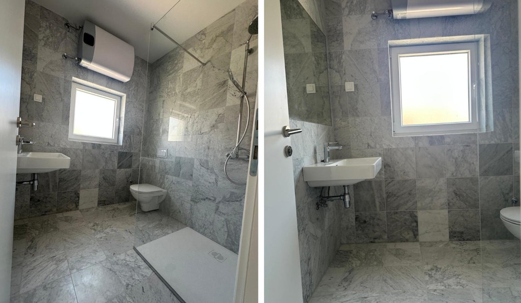 Bagno con doccia, lavabo e WC