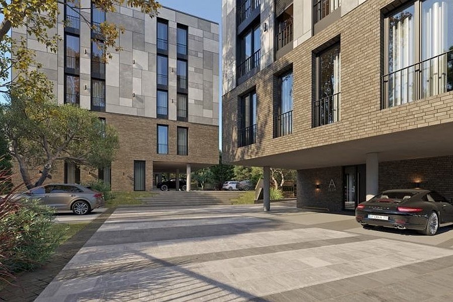Accesso e ingresso del complesso residenziale con parcheggi