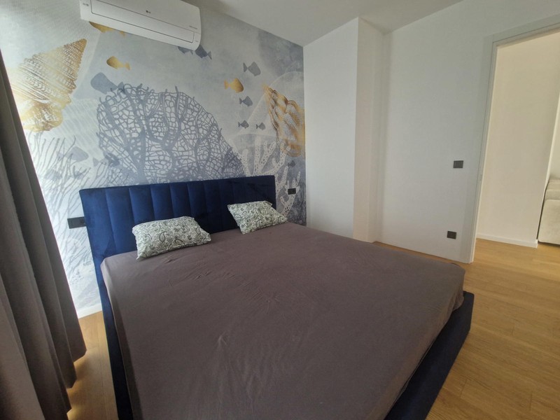 Camera da letto con letto matrimoniale e aria condizionata