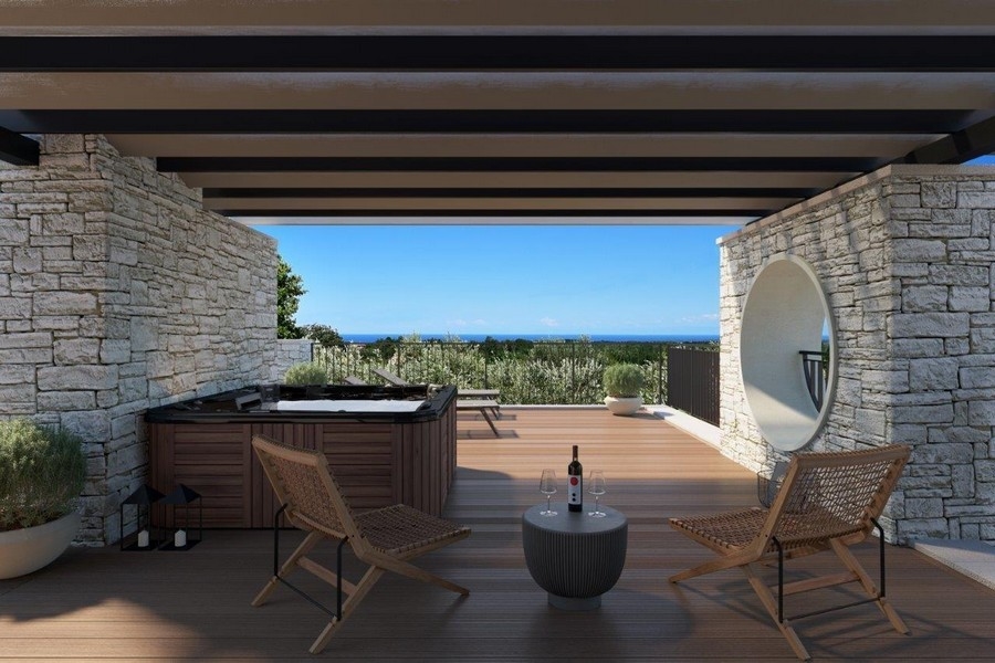 Visualizzazione della lounge con idromassaggio sotto la pergola
