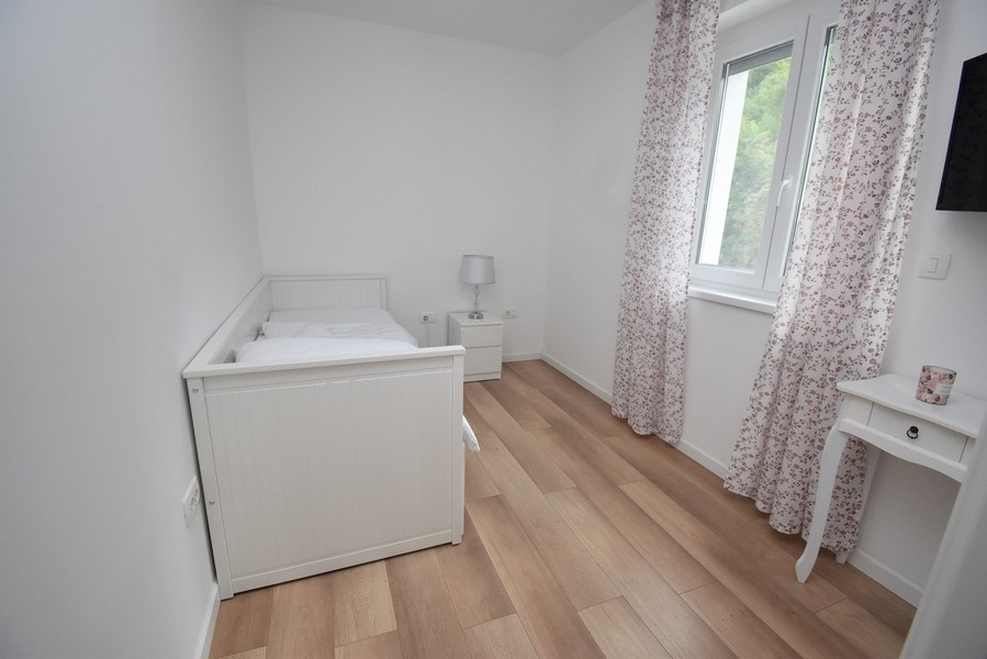 Bagno con lavatrice e WC