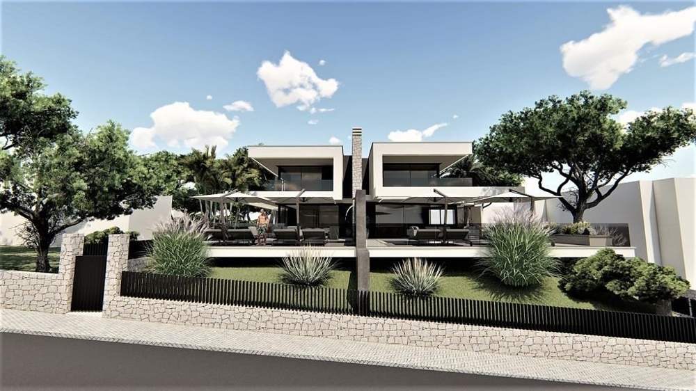Visualizzazione delle case bifamiliari con pergola ed erbe ornamentali