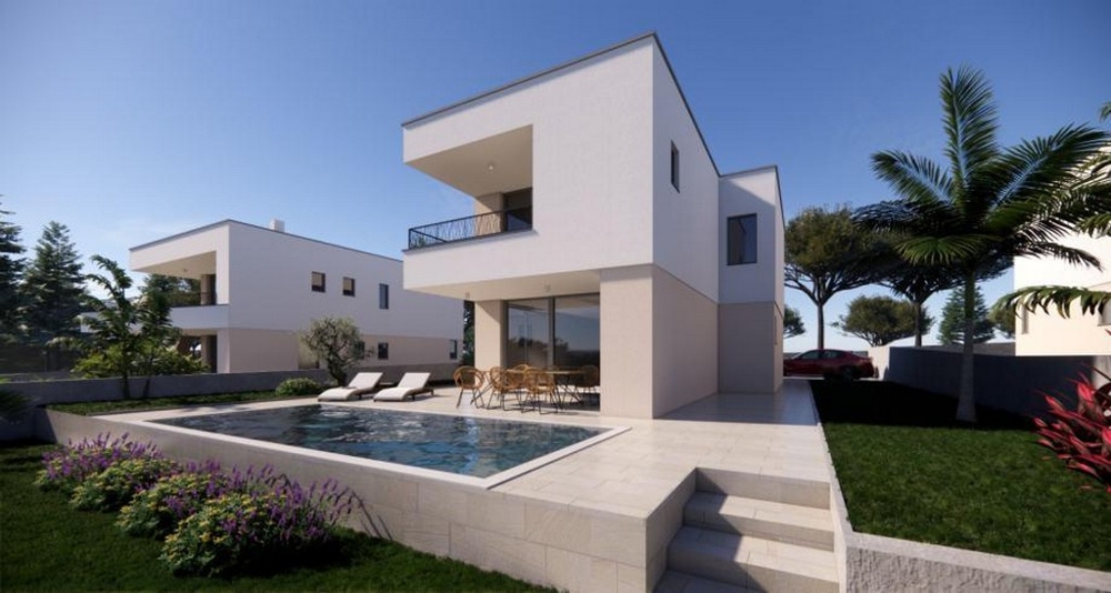 Visualizzazione della villa con piscina e lettini in giardino