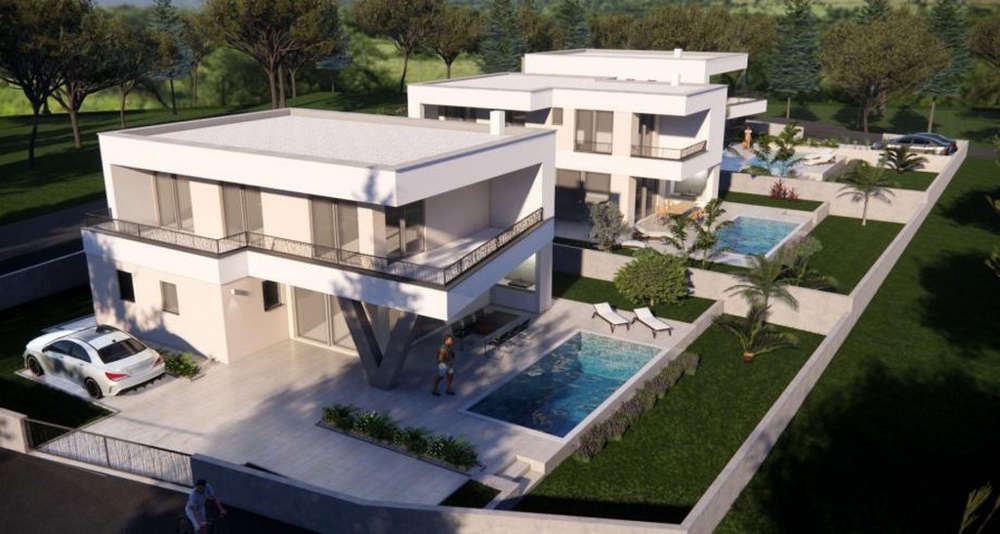 Visualizzazione di più ville con piscina privata nel verde