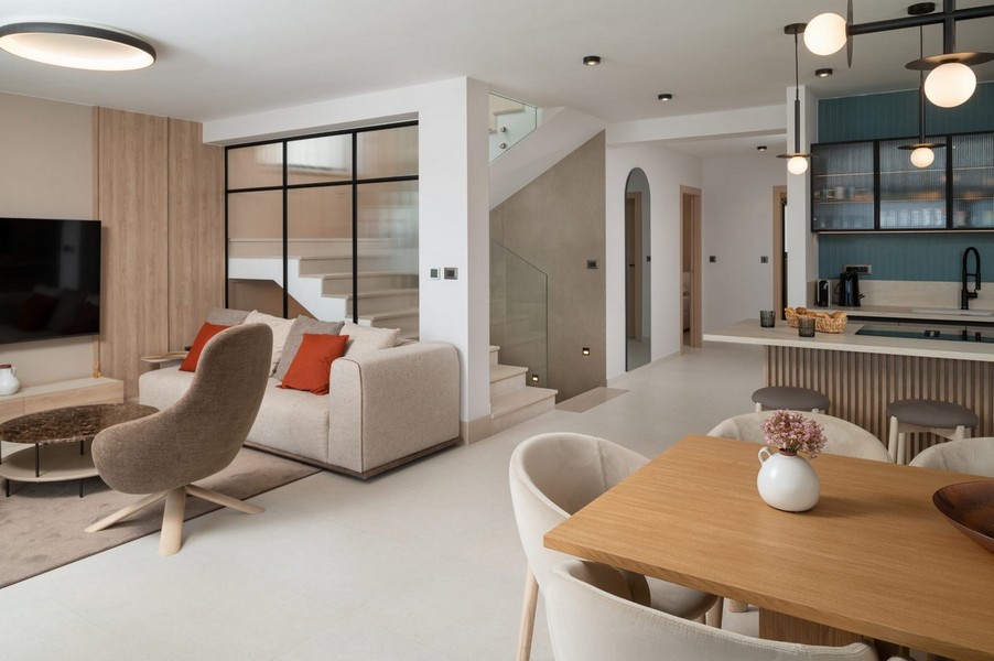 Zona giorno e cucina a vista con design moderno