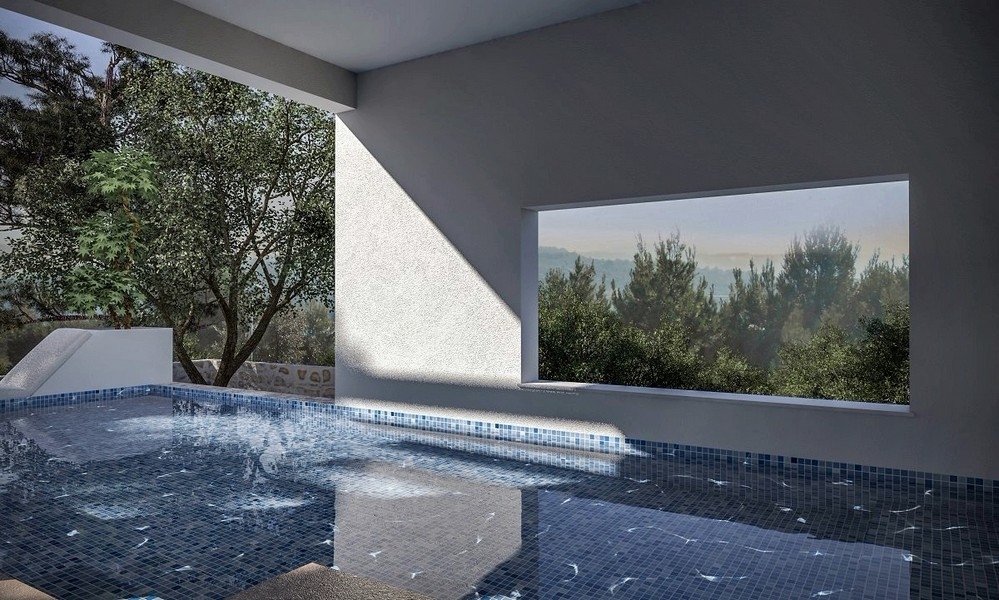 Vista interna di una piscina coperta con vista mare in una villa in vendita a Jezera, Murter, Croazia