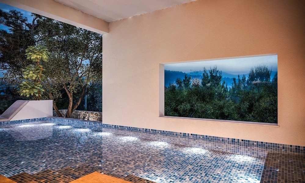 Vista serale della piscina interna illuminata di una villa a Jezera sull'isola di Murter, Croazia, in vendita