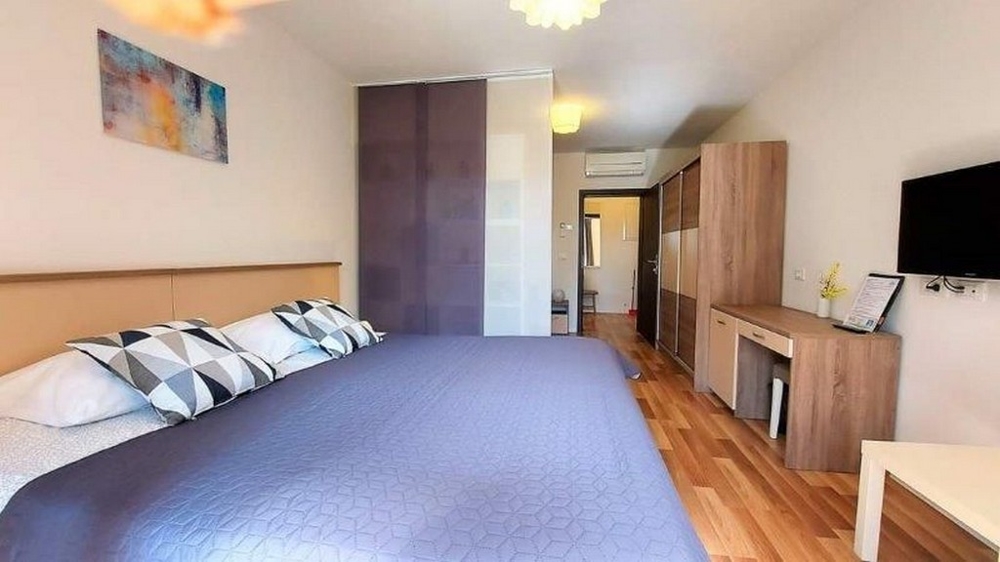 Camera da letto con letto grande e armadio a Rovinj
