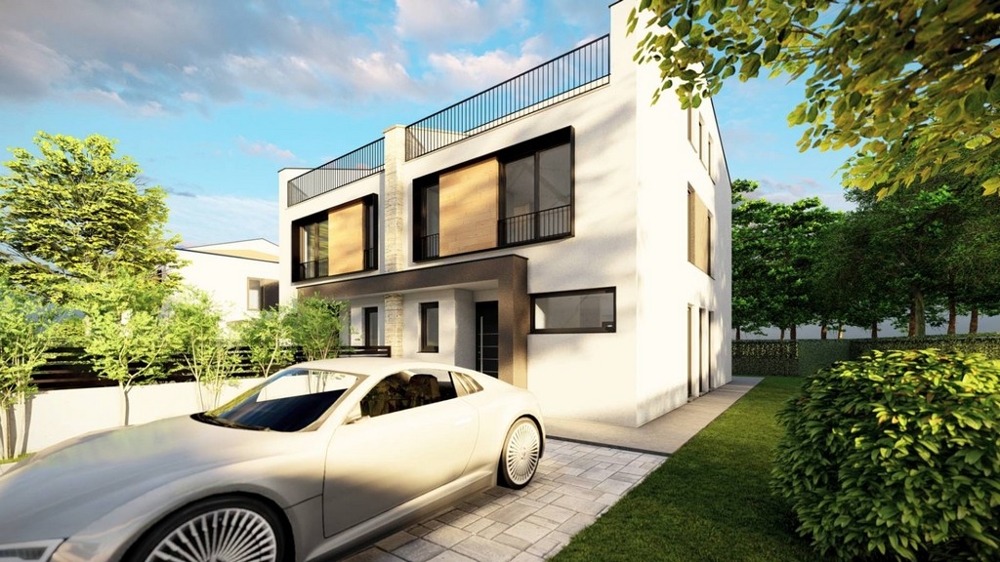 Vista laterale della moderna casa bifamiliare con auto e giardino verde