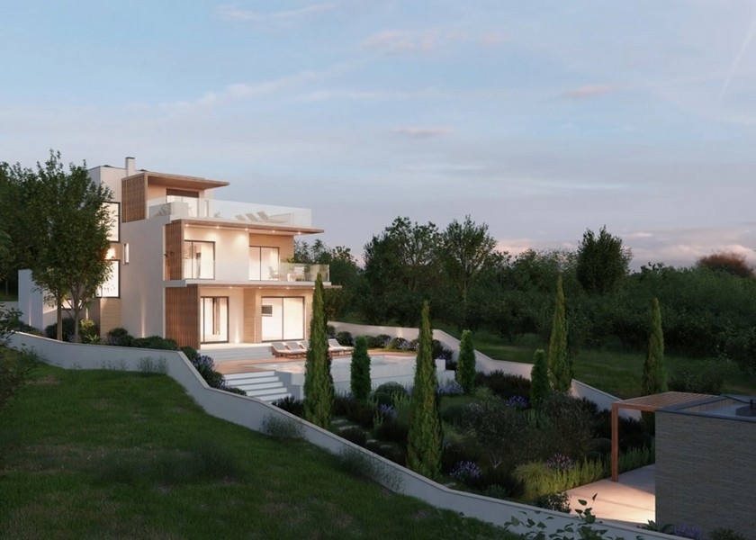 Accogliente soggiorno con camino in una villa moderna in Croazia, vista mare al crepuscolo