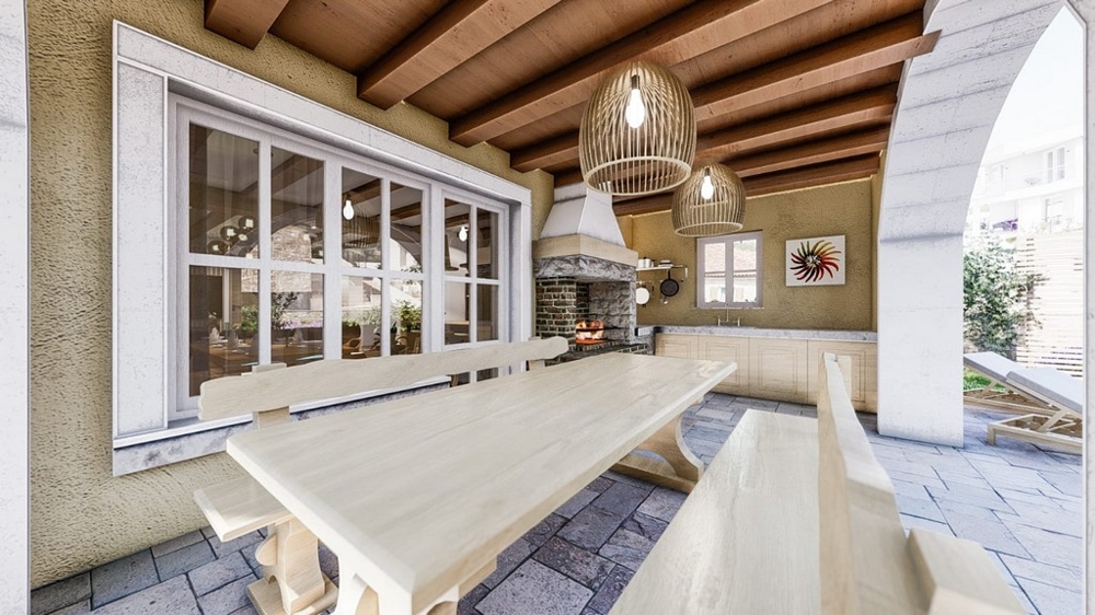 Terrazza esterna coperta con tavolo da pranzo in una villa mediterranea sull'isola di Krk