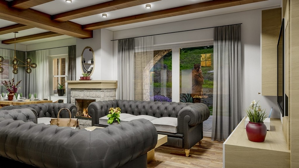 Soggiorno di una villa mediterranea con eleganti divani grigi e vista sul giardino sull'isola di Krk