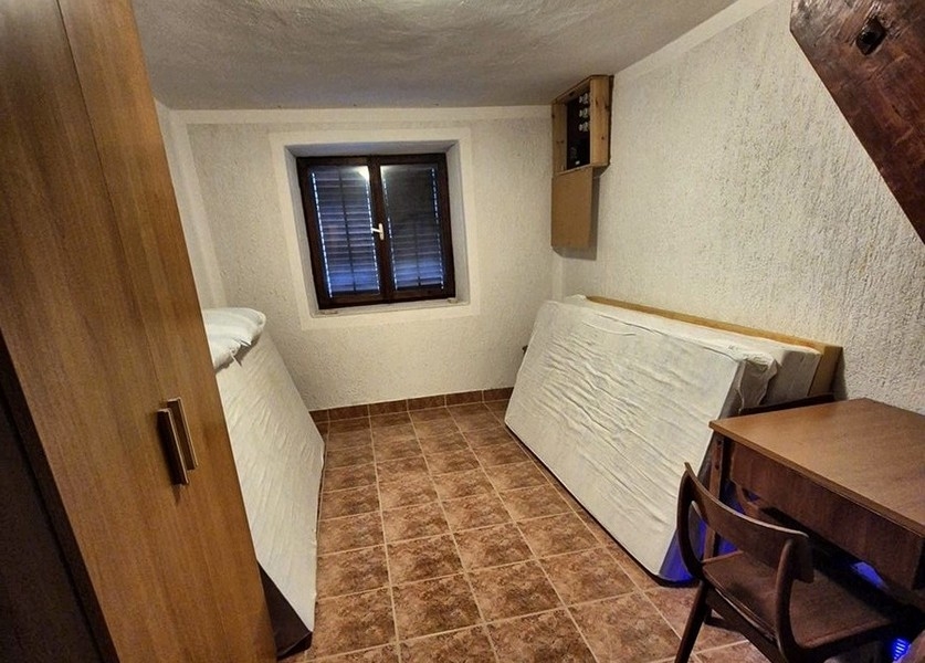 Camera da letto dell'immobile H3401 in Croazia.