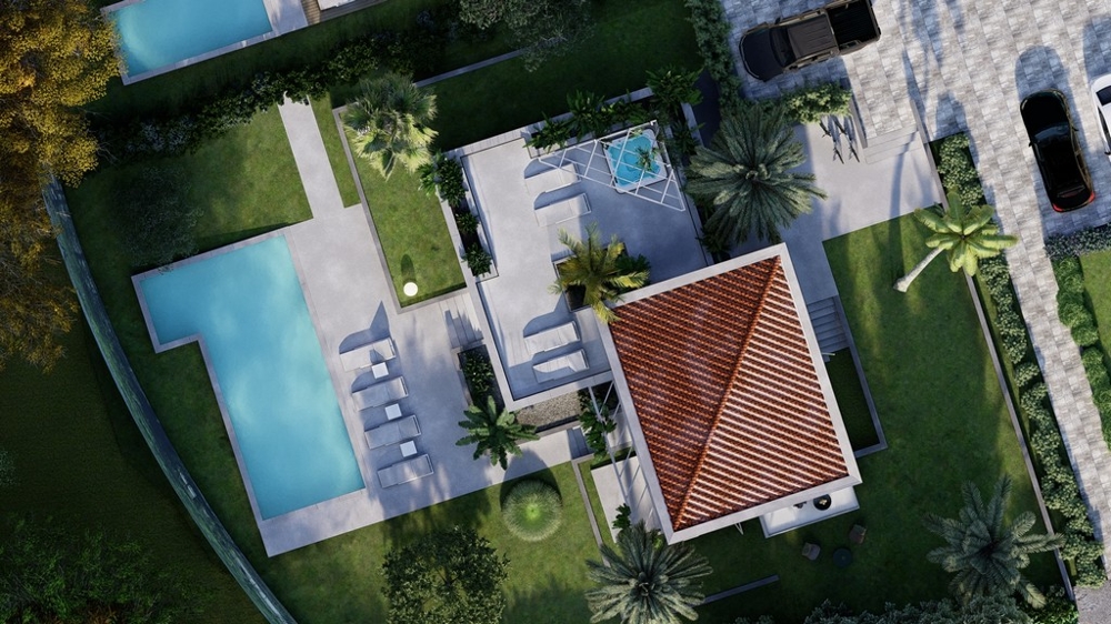 Veduta aerea della villa con piscina e giardino