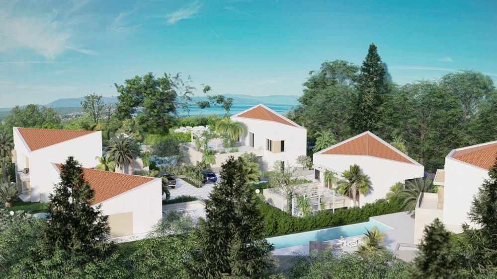 Complesso di ville con piscine e vegetazione rigogliosa