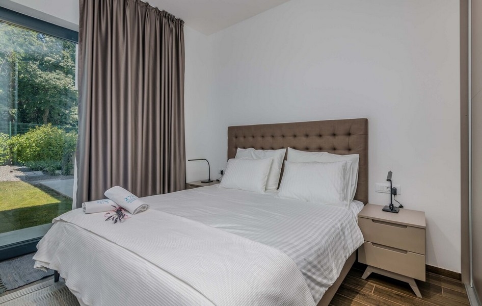 Camera da letto con accesso al giardino