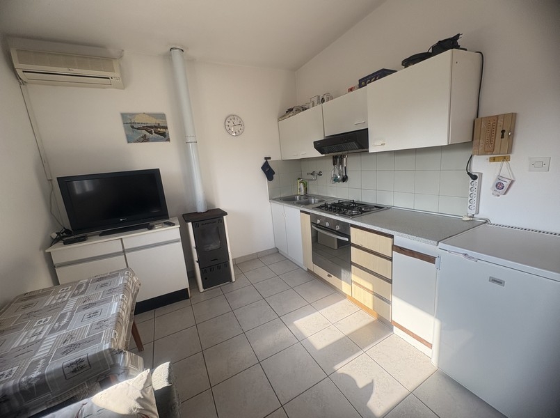 Cucina con zona giorno