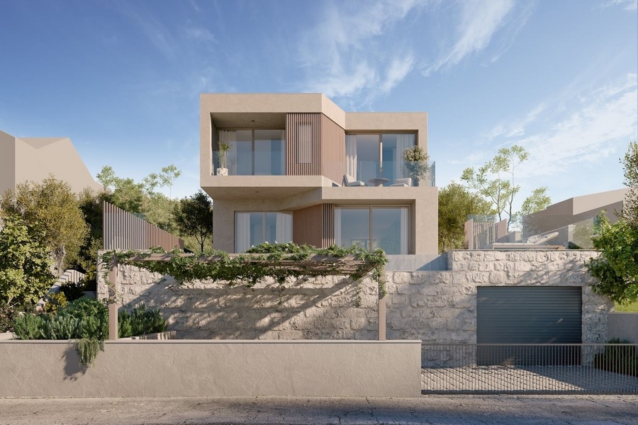 Cucina moderna con isola e accesso al giardino