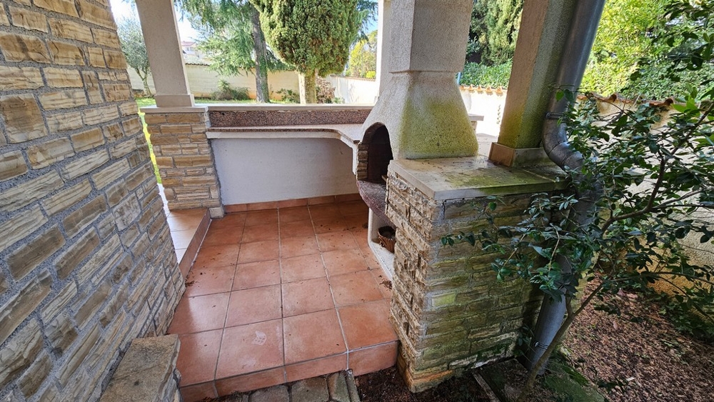 Cucina esterna con grill sulla terrazza